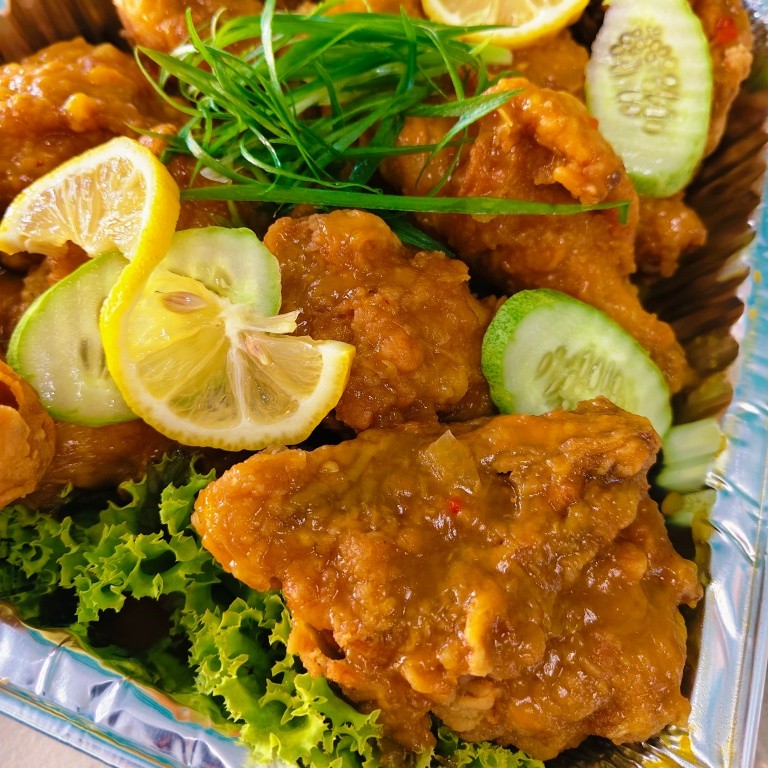 Saucy halal chicken close-up